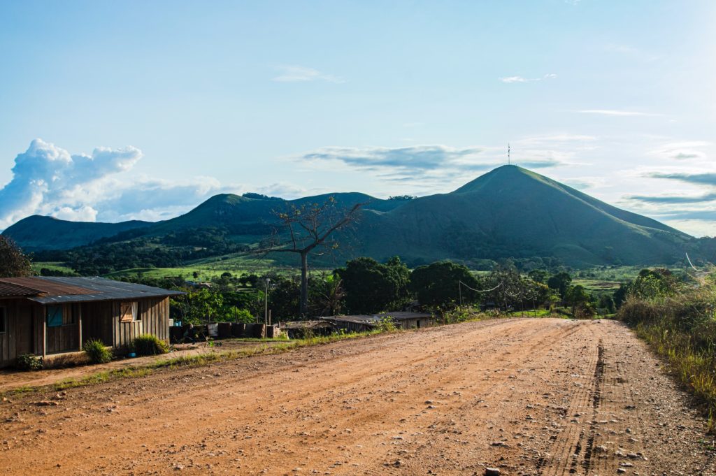 A road beside a hilly environment
